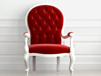roter Sessel beim Thema Farbenpsychologie beim Wohnen
